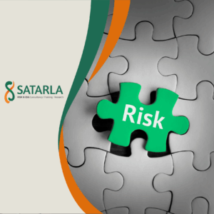 A green puzzle piece with the word "risk" written on it completing a larger grey puzzle.